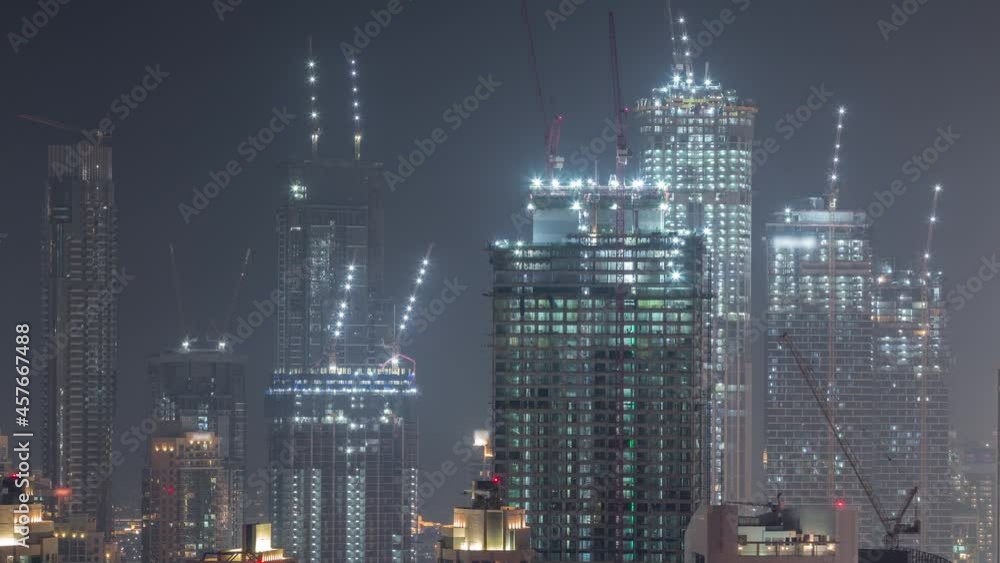 custom made wallpaper toronto digitalHigh multi-storey buildings under construction and cranes at night timelapse