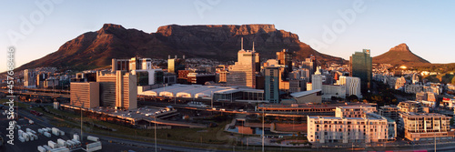 Aerial panoramic view of the City of Cape Town skyline at sunrise.