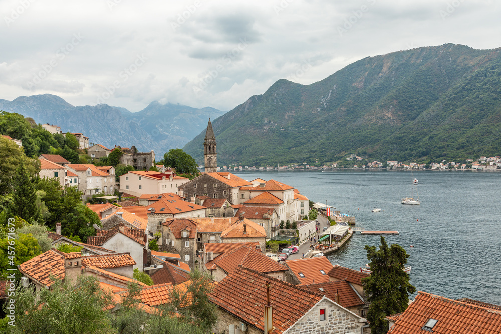 Panorama of medieval town Perast with orange tiled houses, Kotor Bay, Montenegro