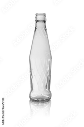 Wallpaper Mural Empty glass bottle with a pattern, transparent without a lid. Isolated on a white background, with reflection. Torontodigital.ca