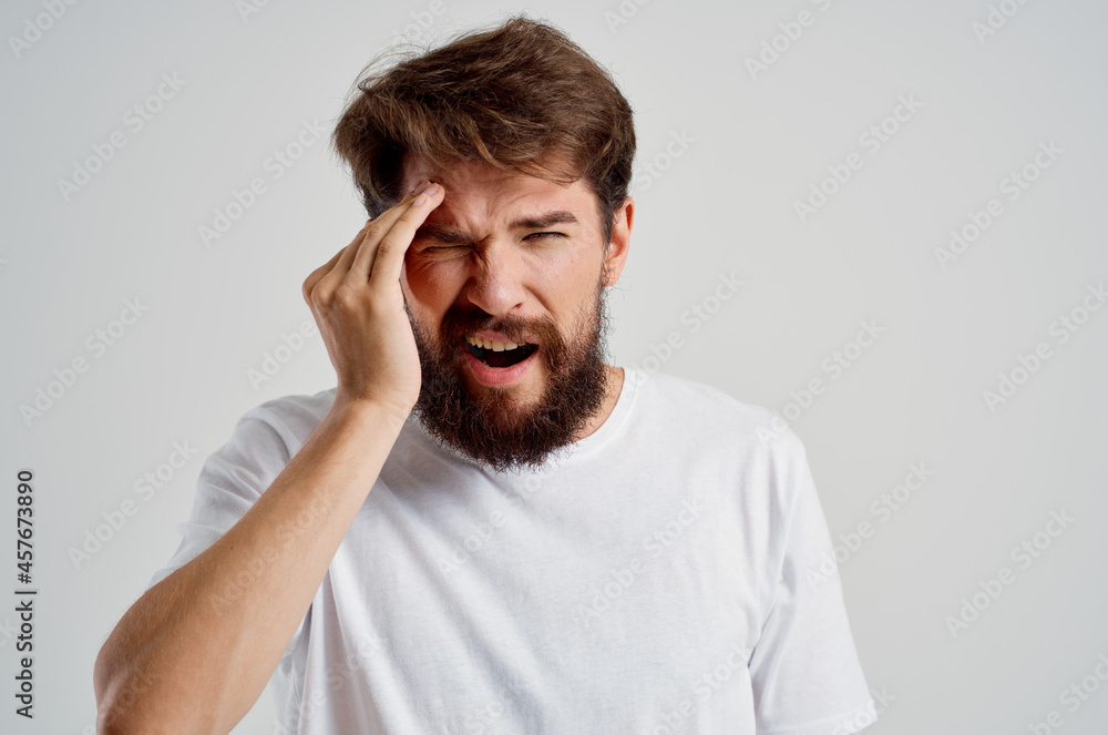 bearded man health problems migraine stress disorder light background bearded man health problems migraine stress disorder light background