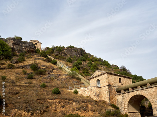 Photography of Canal de Isabel II aqueduct at the entrance of Patones de Arriba, a charming village in the mountains of Madrid. Spain, Europe