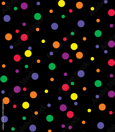 Colored polka dots of various sizes on a black background