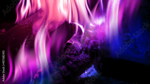 The texture of the flame on a black background. The ultraviolet glow of the fire. 3d illustration © Laura Сrazy