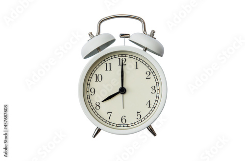 White vintage alarm clock the time on 8 o'clock, isolated on white background with clipping path, for decoration design, copy space background.