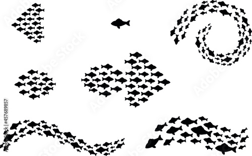 Set of silhouettes of groups of marine fish. A colony of small fish.