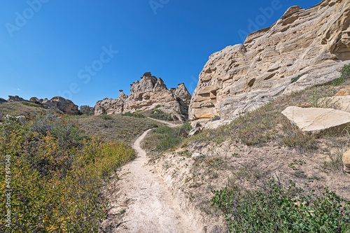 Path leading to eroded rock in Writing on Stone Provincial Park, Alberta, Canada