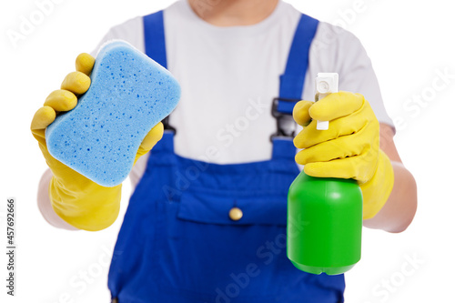 wipe and detergent in professional cleaner hands isolated on white background