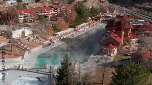 Aerial: Glenwood Hot Springs and traffic. Glenwood Springs, Colorado, USA photo