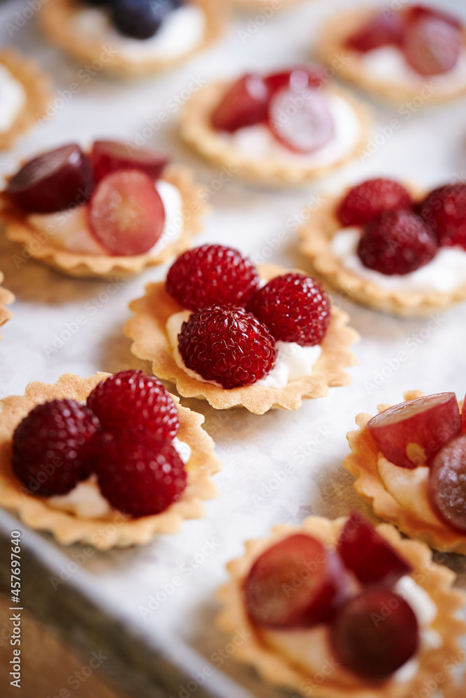 Fruit tarts with raspberries on a plate Fruit tarts with raspberries on a plate