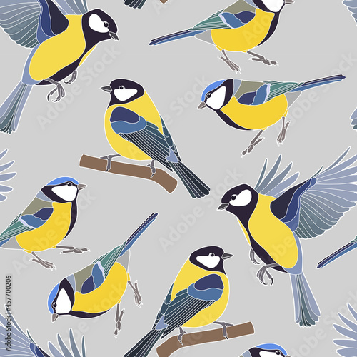 Seamless background. Beautiful tits. Yellow-blue little birds. 