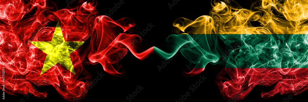 Vietnam, Vietnamese vs Lithuania, Lithuanian smoke flags side by side. Vietnam, Vietnamese vs Lithuania, Lithuanian smoke flags side by side.