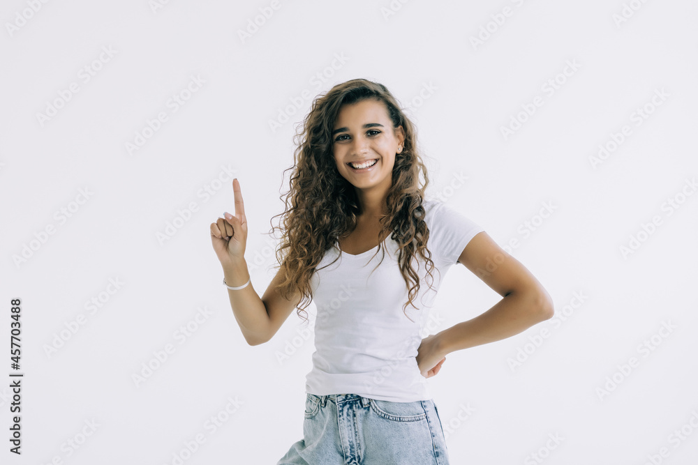 Young pretty woman pointed up isolated on white background Young pretty woman pointed up isolated on white background