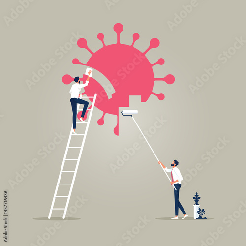Businessman erasing red COVID-19 virus with paint roller, survive and win in Coronavirus outbreak COVID-19 economic crisis concept