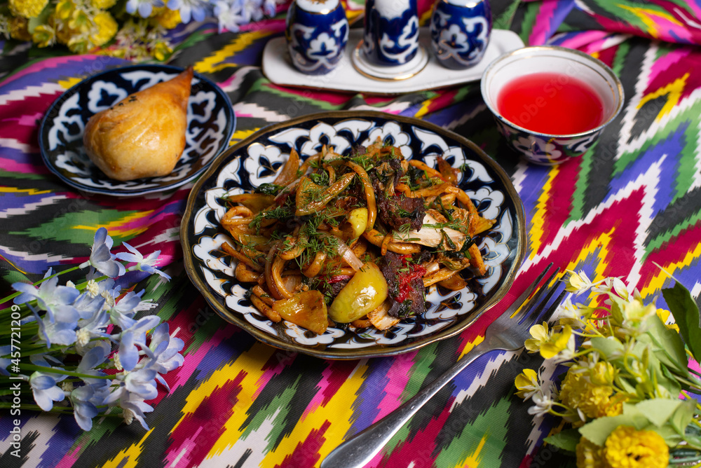 Uyghur national dish lagman on oriental background