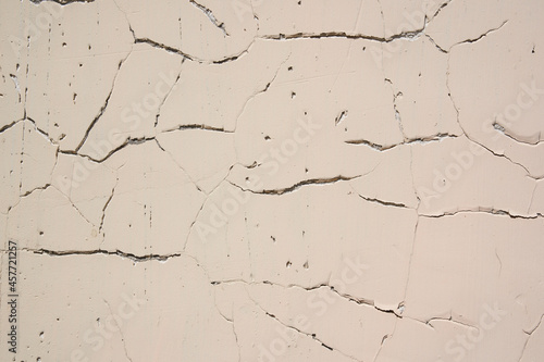 Overlay for your design. Background texture of a white cement wall with a crack. A crack in the old wall. High quality photo