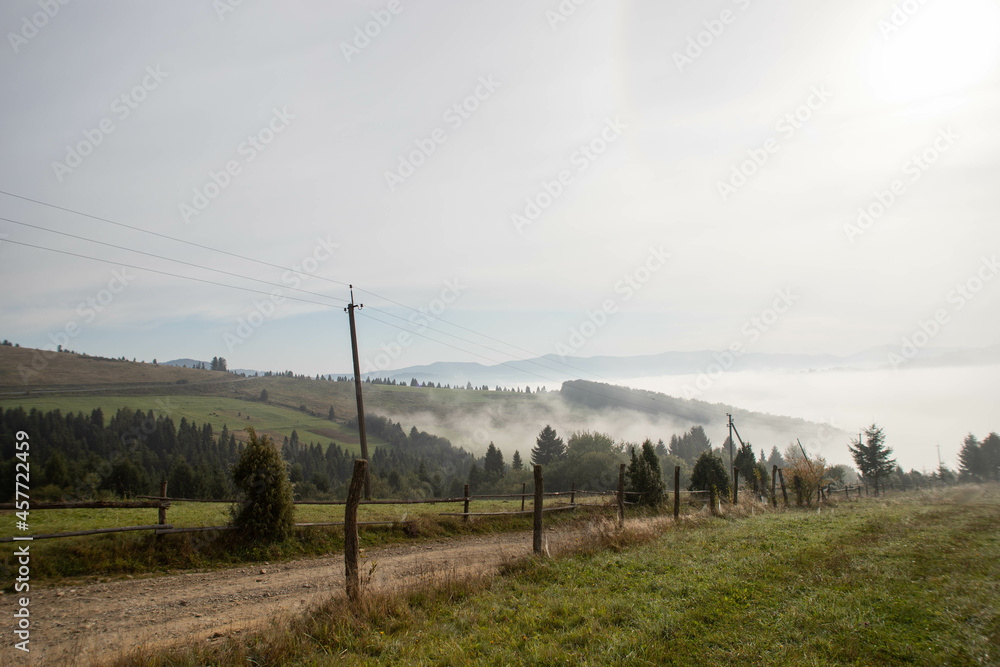 Obraz premium view of the mountains in the fog