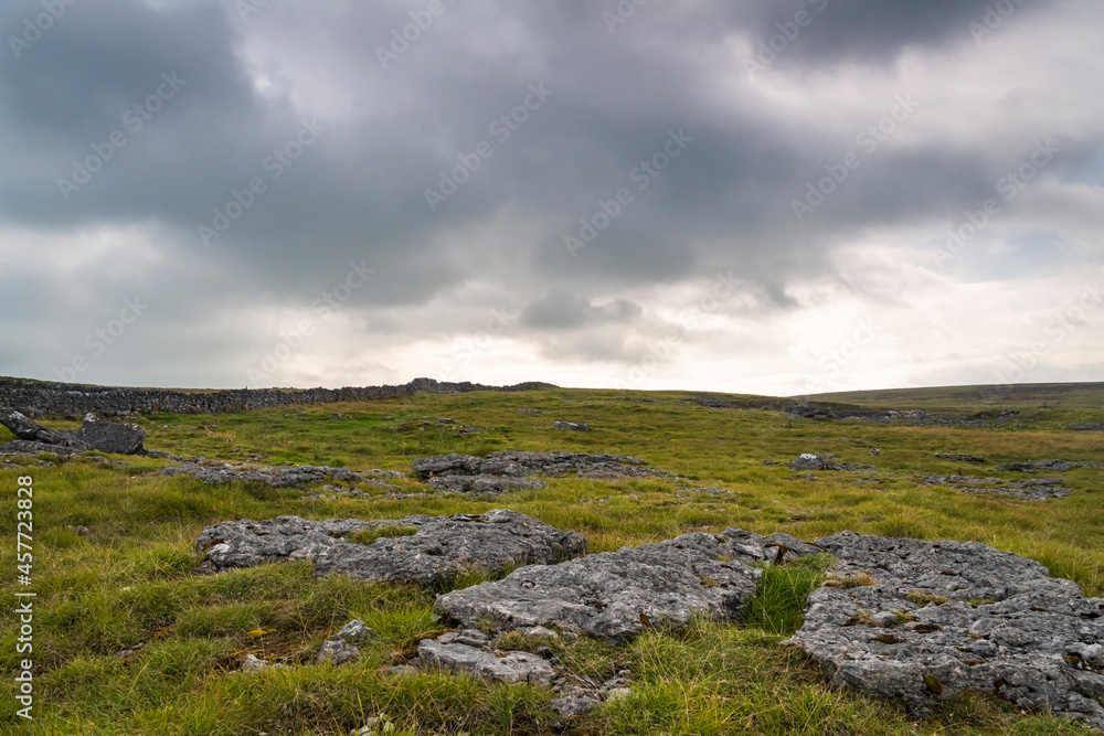 A cloudy late summer 3 shot HDR image of Limestone pavement on Orton Fell, above Orton, in Cumbria, England. 