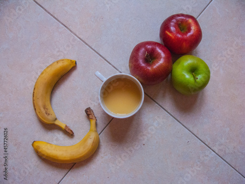 Healthy fruits. Apples and bannans. Juice. photo