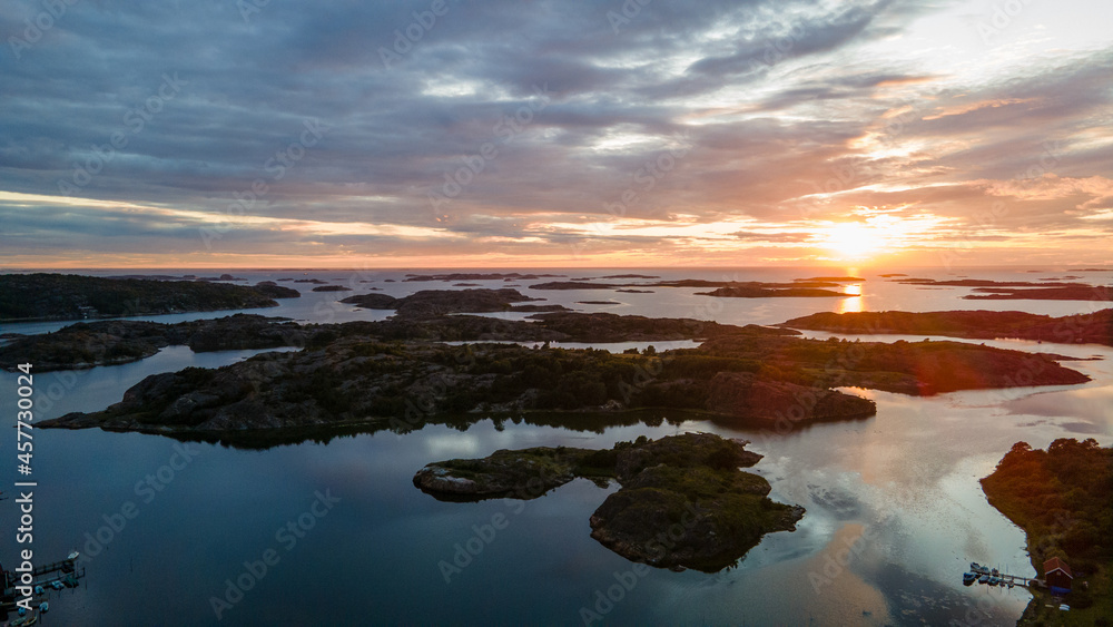Sunset at the Swedish archipelago in Bohuslän with clouds in the sky - Drone Perspective Landscape Photography