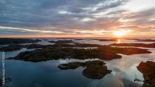 Sunset at the Swedish archipelago in Bohusl  n with clouds in the sky - Drone Perspective Landscape Photography