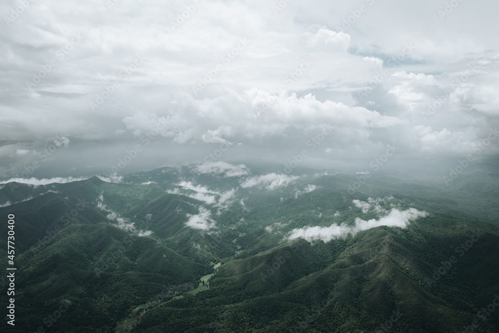 Aerial view of mountain area with overcast cloud in the sky , chiang mai north of thailand , calm and mindfulness concept