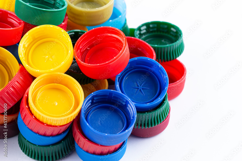 Group of multi colored bottle caps Group of multi colored bottle caps