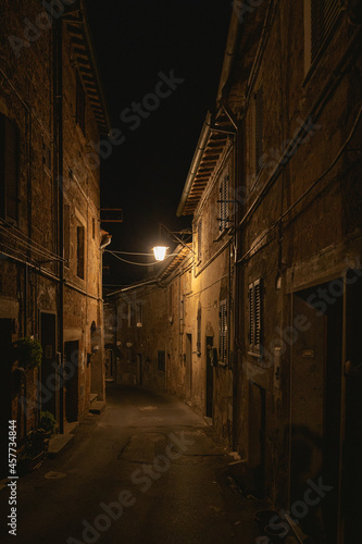 old mediterranean alley at night in acquapendente  italy