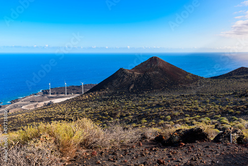 Mountain of Lagi, a volcano cinder cone in the Island of La Palma, one of the Canary Islands, in the Cumbre Vieja volcano area near Teneguia volcano. Windmill farm