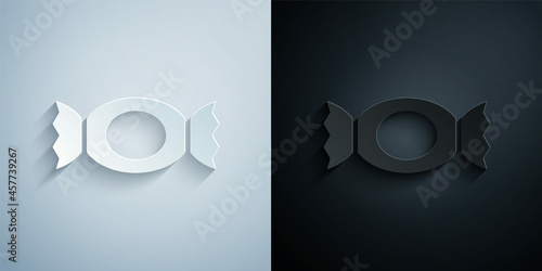 Paper cut Candy icon isolated on grey and black background. Happy Halloween party. Paper art style. Vector