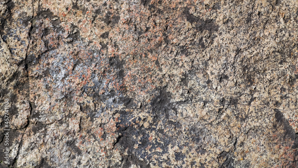 Granite stone surface texture. Texture of rough granit stone surface background. Abstract background from natural material Granite stone surface texture. Texture of rough granit stone surface background. Abstract background from natural material
