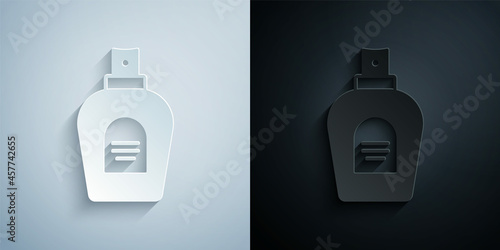 Paper cut Perfume icon isolated on grey and black background. Paper art style. Vector