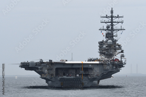 United States Navy aircraft carrier USS Ronald Reagan sailing in Tokyo Bay.