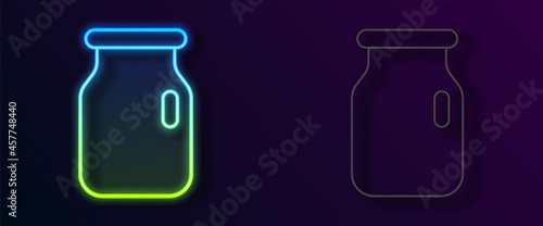 Glowing neon line Glass jar with screw-cap icon isolated on black background. Vector