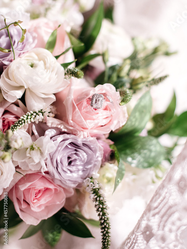 bridal bouquet of pastel pink and purple roses 