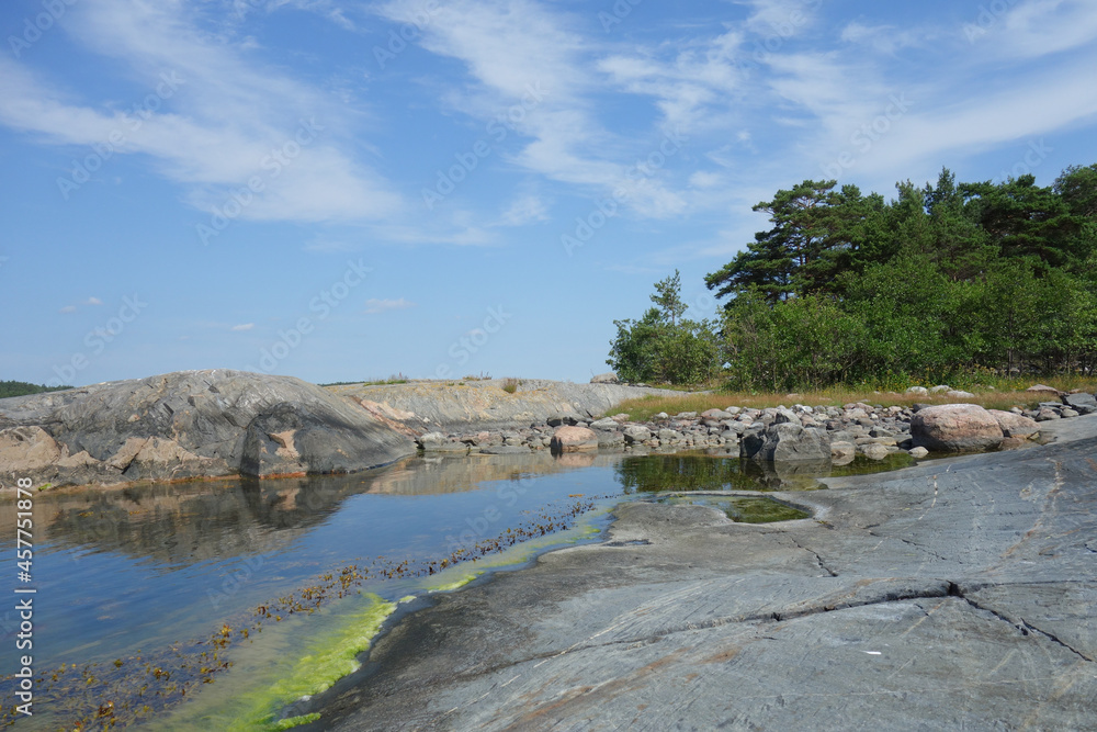 Rocky island in the archipelago of Finland by the Baltic Sea in summer
