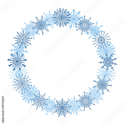 Beautiful winter season  Christmas  New Year round frame  wreath with hand drawn blue snowflakes isolated on white background. Winter festive design template with empty copy space. Frost crystals