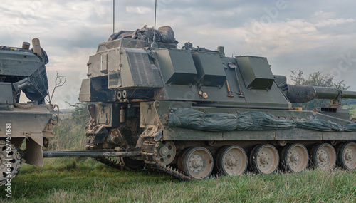 British Army Challenger Armored Repair and Recovery Vehicle (CRARRV) towing an AS-90 Gun Equipment 155mm L131 on military training exercise, Wilts UK