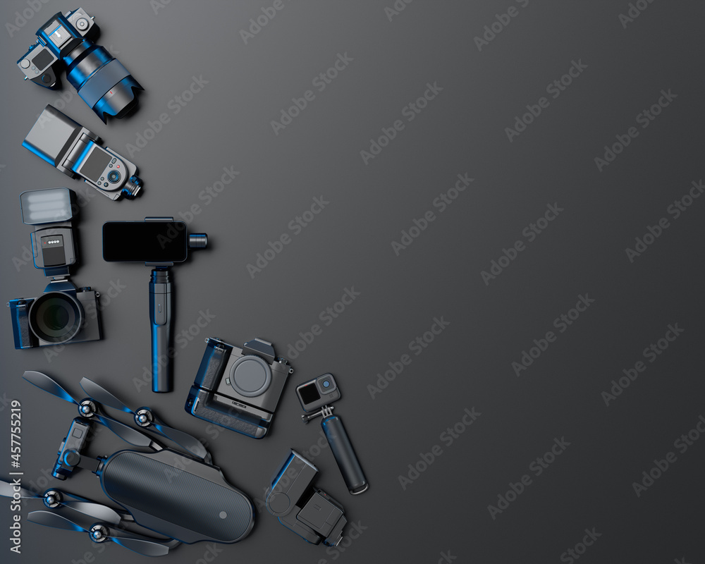 Naklejka premium Top view of designer workspace and photography gear on black table background