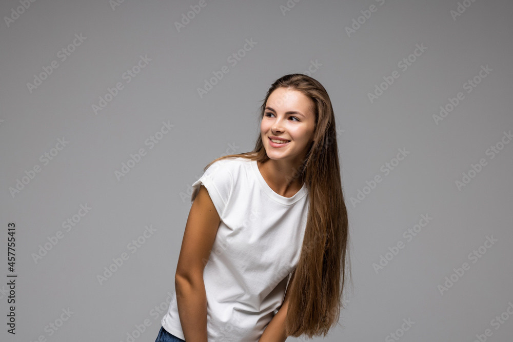 Obraz premium Beautiful young woman isolated on grey background