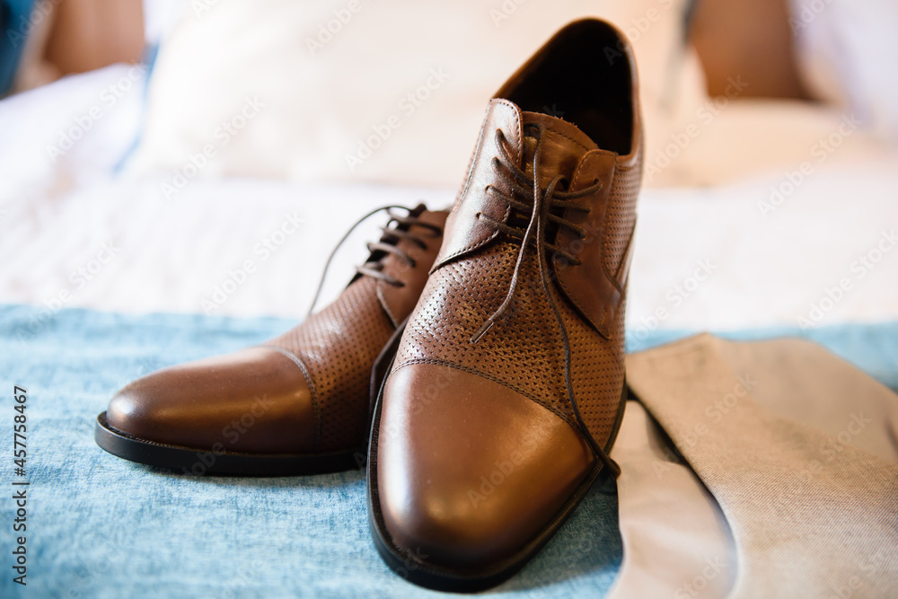 The man's clothes are classic and brown shoes. Dressing a gentleman for a reception. The man's clothes are classic and brown shoes. Dressing a gentleman for a reception.