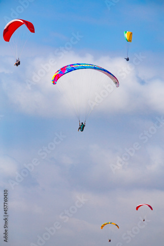 Five Paragliders In Air