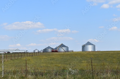 Grain Bins in a Field