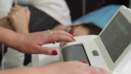 Wallpaper Mural Pregnant Woman On Hospital Couch During Medical Control Cardiotocography. Gynecologist Doctor Hands Turn On Adjust CTG Device Clinic Consultant. Examine Expectant Belly Baby Mother Healthcare Check Up Torontodigital.ca