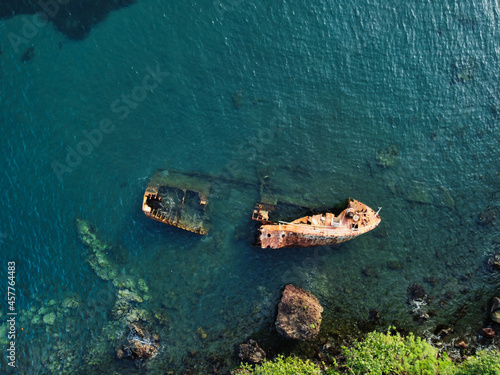 Wrecked ship on Caribbean sea aerial drone view