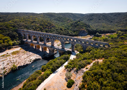 The aerial view of the Pont du Gard, an ancient tri-level Roman aqueduct bridge in France
