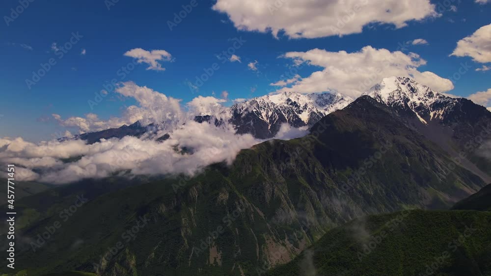Mountain Ridge of Caucasian Range Partly Covered with Snow. Aerial View Mountain Ridge of Caucasian Range Partly Covered with Snow. Aerial View