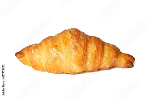Baked bread croissant on a white background