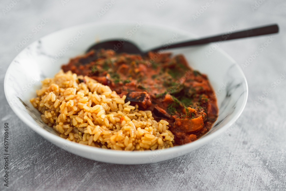 vegan eggplant lentil curry with brown rice, healthy plant-based food vegan eggplant lentil curry with brown rice, healthy plant-based food