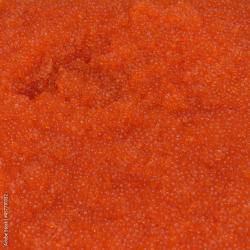 Red caviar for backdrop. Many of eggs. Concept of gourmet seafood, a source of vitamins.